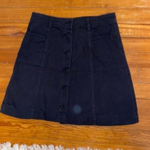 Black denim mini skirt
